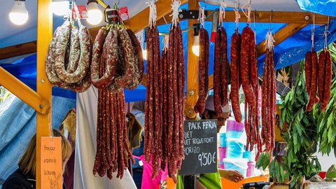 chorizo sausage hanging in a market