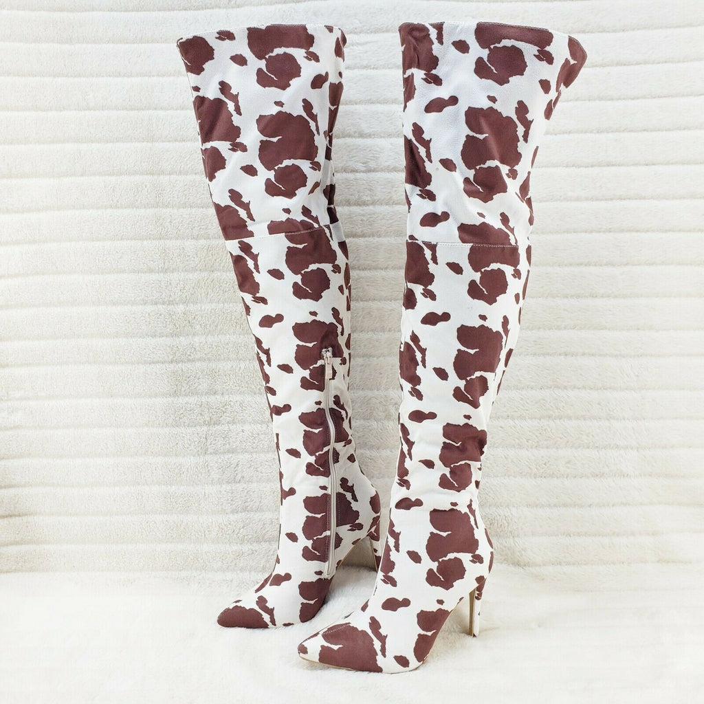 cow print thigh boots