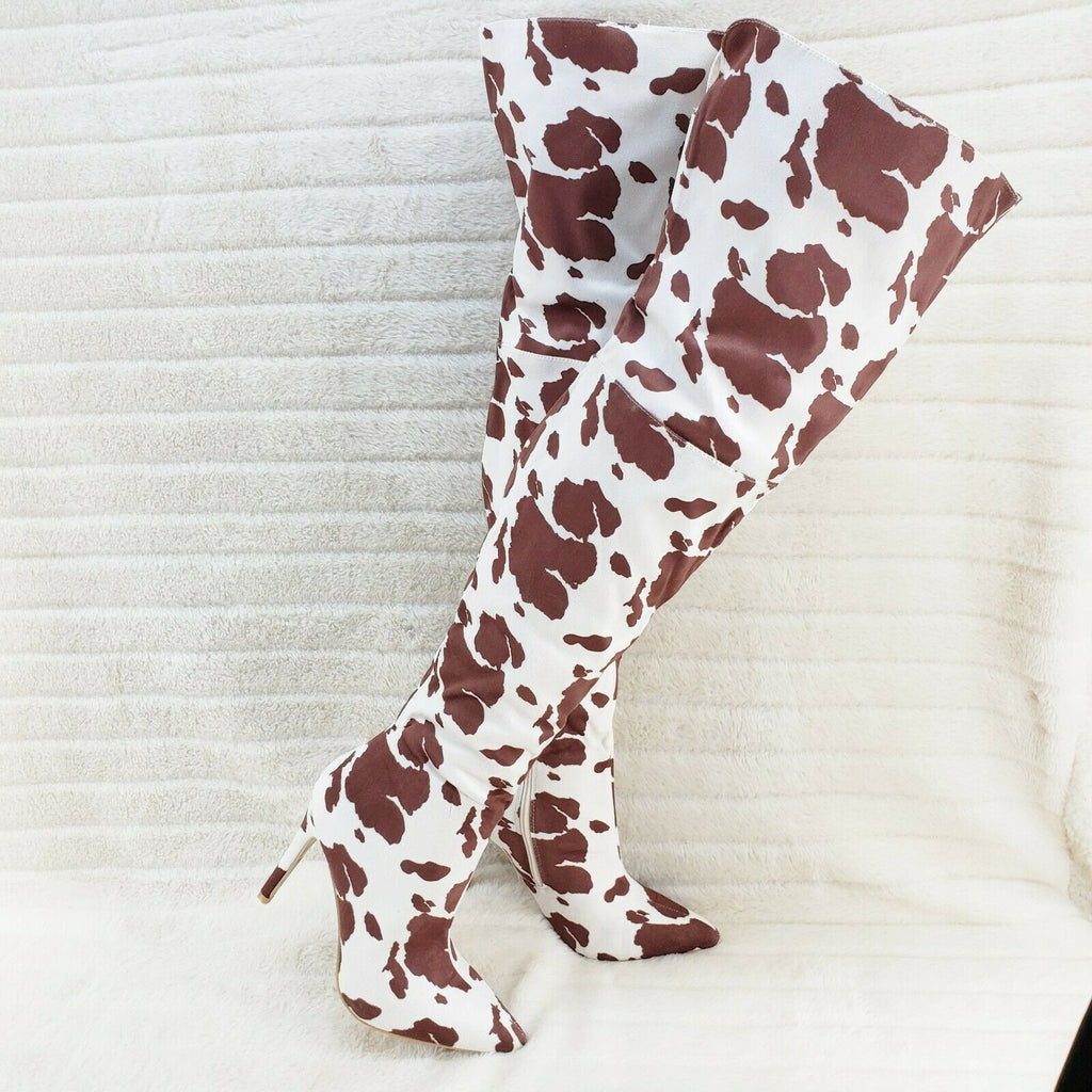 cow print thigh boots