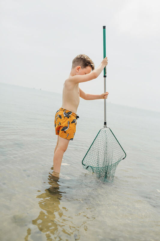 Fashionable and stylish summer swim shorts for boys made from recycled plastic bottles, clothes made for explorers