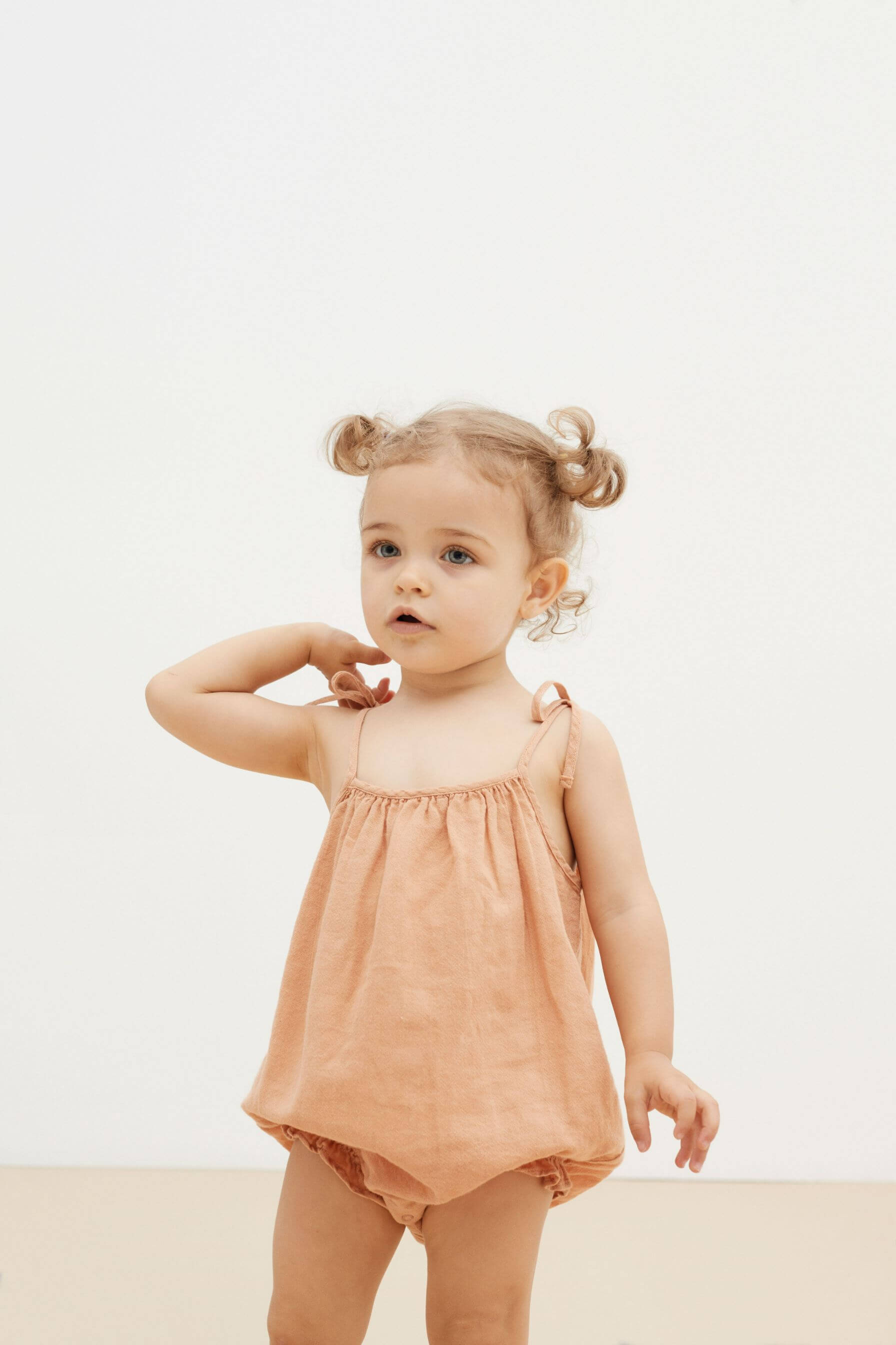 Extra soft and gentle organic cotton baby clothing and baby girls romper for stylish babies online in Hong Kong and Singapore.
