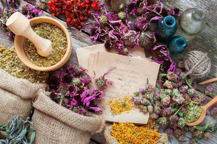dried herbs, mortar and pestle, handwritten recipe