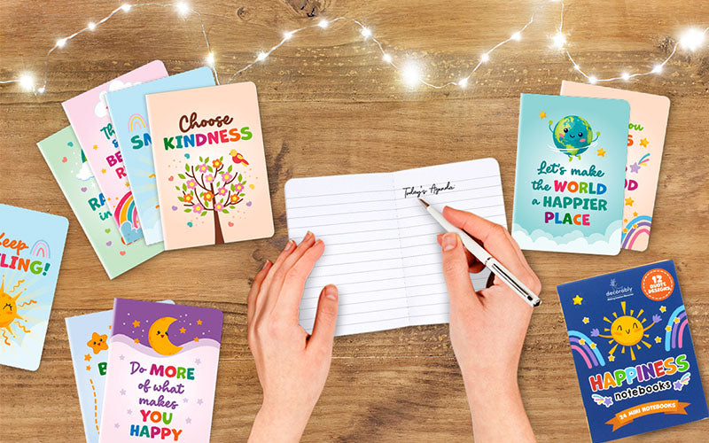 The Happy Notes Mini Notebook Set has happy quotes and pretty designs