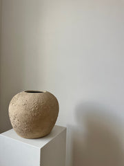 Warm beige textured rounded vase
