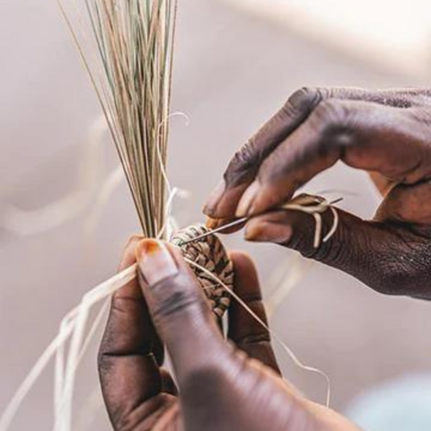 Hands weaving sisal from All Across Africa