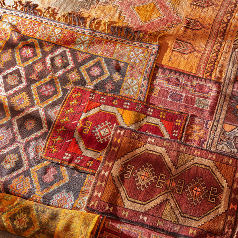 Variety of antique rugs together