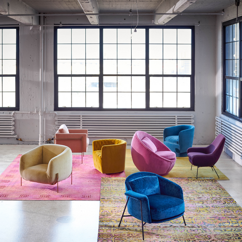 Variety of Upholstered Chairs in warehouse style room