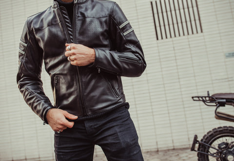 Male motorcyclist modeling a European Fit or Slim Fit style motorcycle jacket.