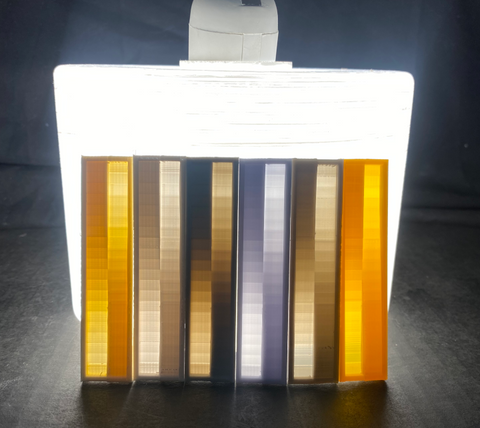 Six Lithophane Calibration Towers showing American Filament Lithophane Colors
