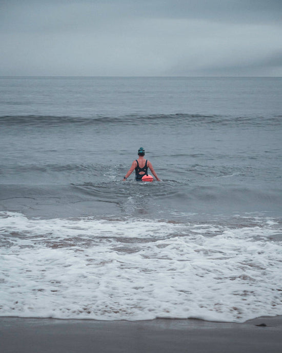 Swimming entering the sea