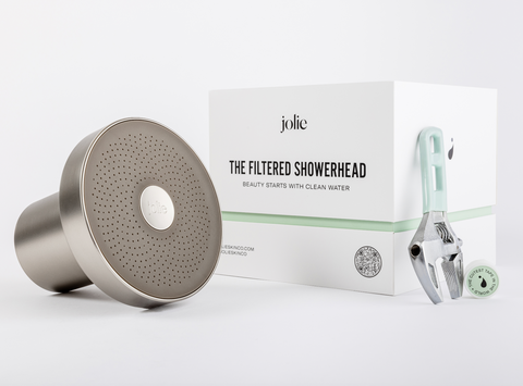 unboxed contents of a hair loss shower filter by Jolie