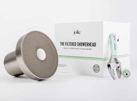 Jolie Filtered Showerhead sitting aside its labeled box