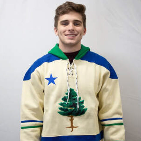 Erik in a Maine State Sweater (2022).
