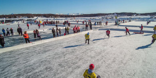 Image of players on the ice at the Last Frontier Pond Hockey Classic.