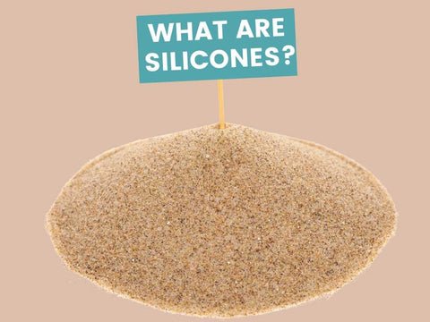 pile of sand with what are silicones written. 