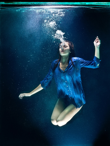 underwater photography of a woman