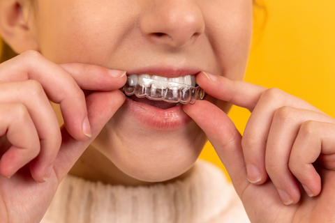 a person wearing a mouthguard