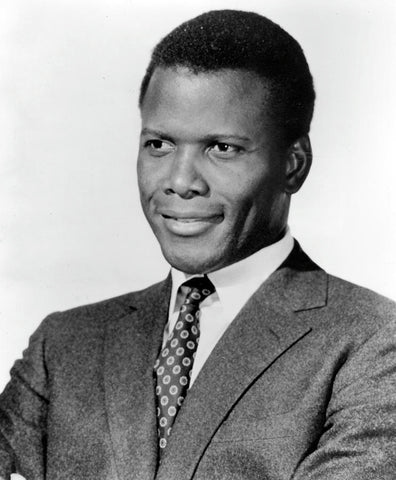 Sidner Poitier in a well-tailored suit. (B&W)