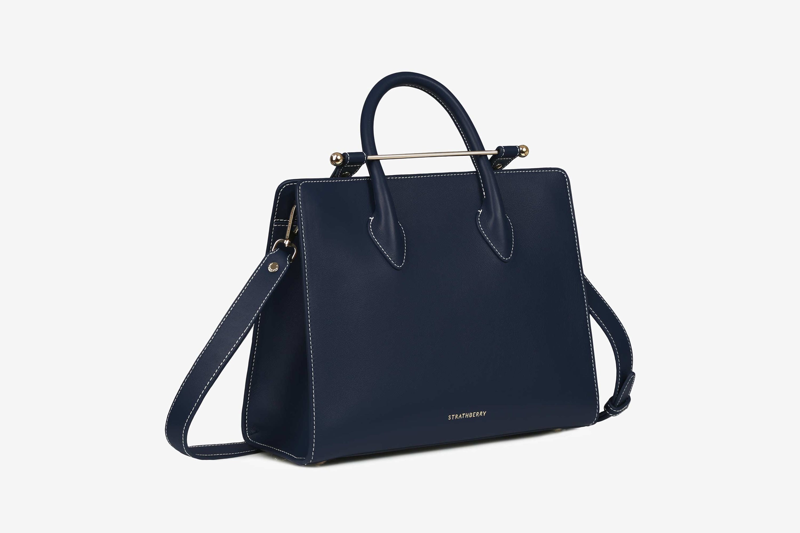 A view showcasing our The Strathberry Midi Tote - Navy with Vanilla Stitch