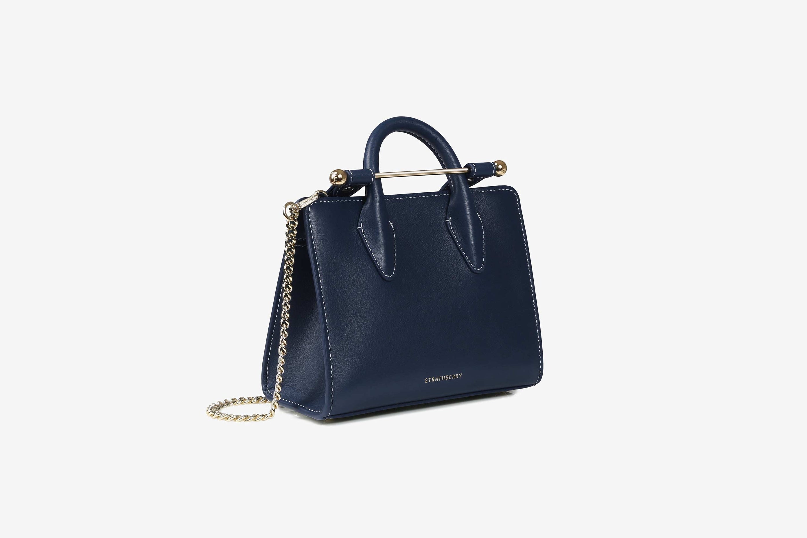 A view showcasing our The Strathberry Nano Tote - Navy with Vanilla Stitch
