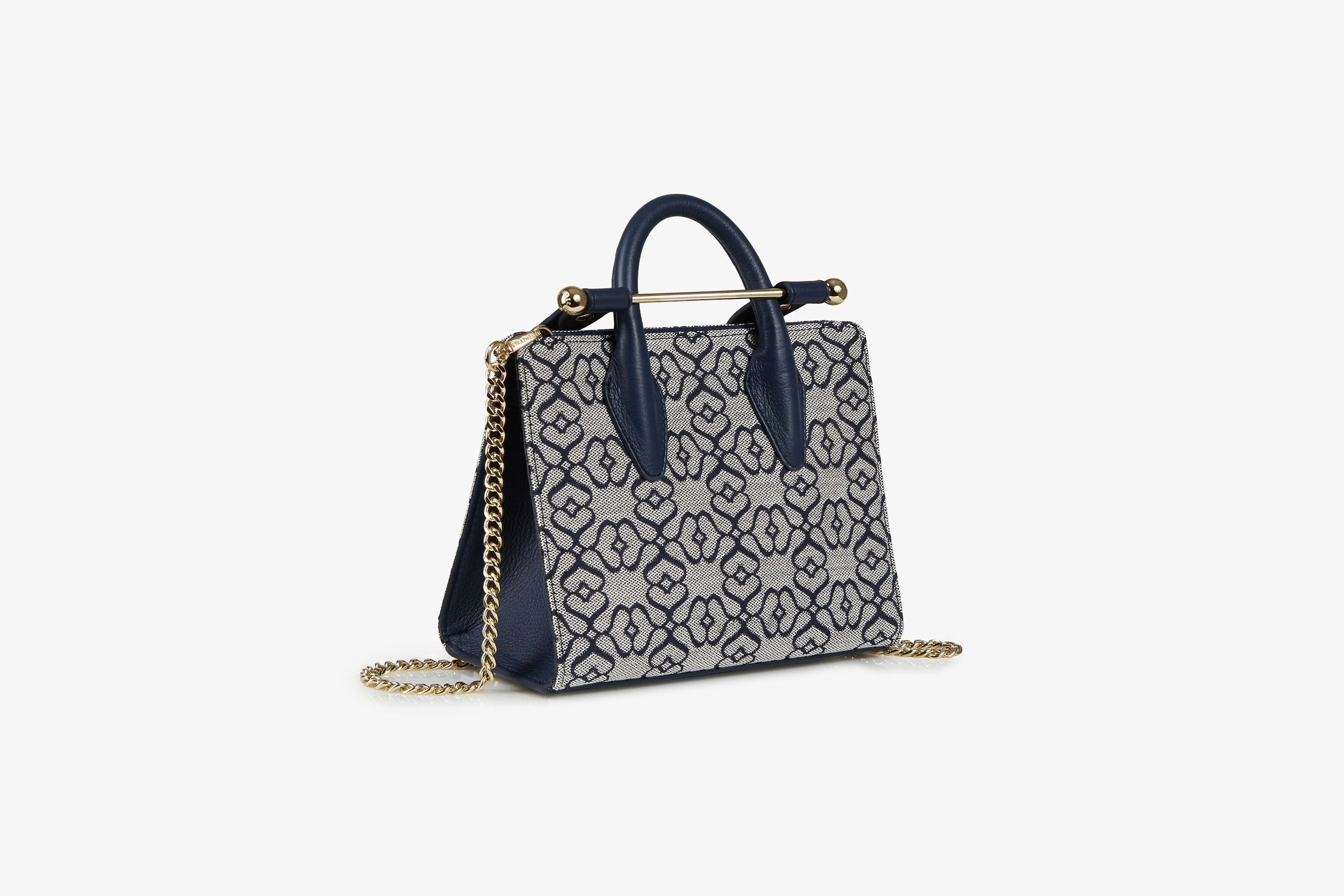 A view showcasing our The Strathberry Nano Tote - Monogram Jacquard/Leather Light Navy