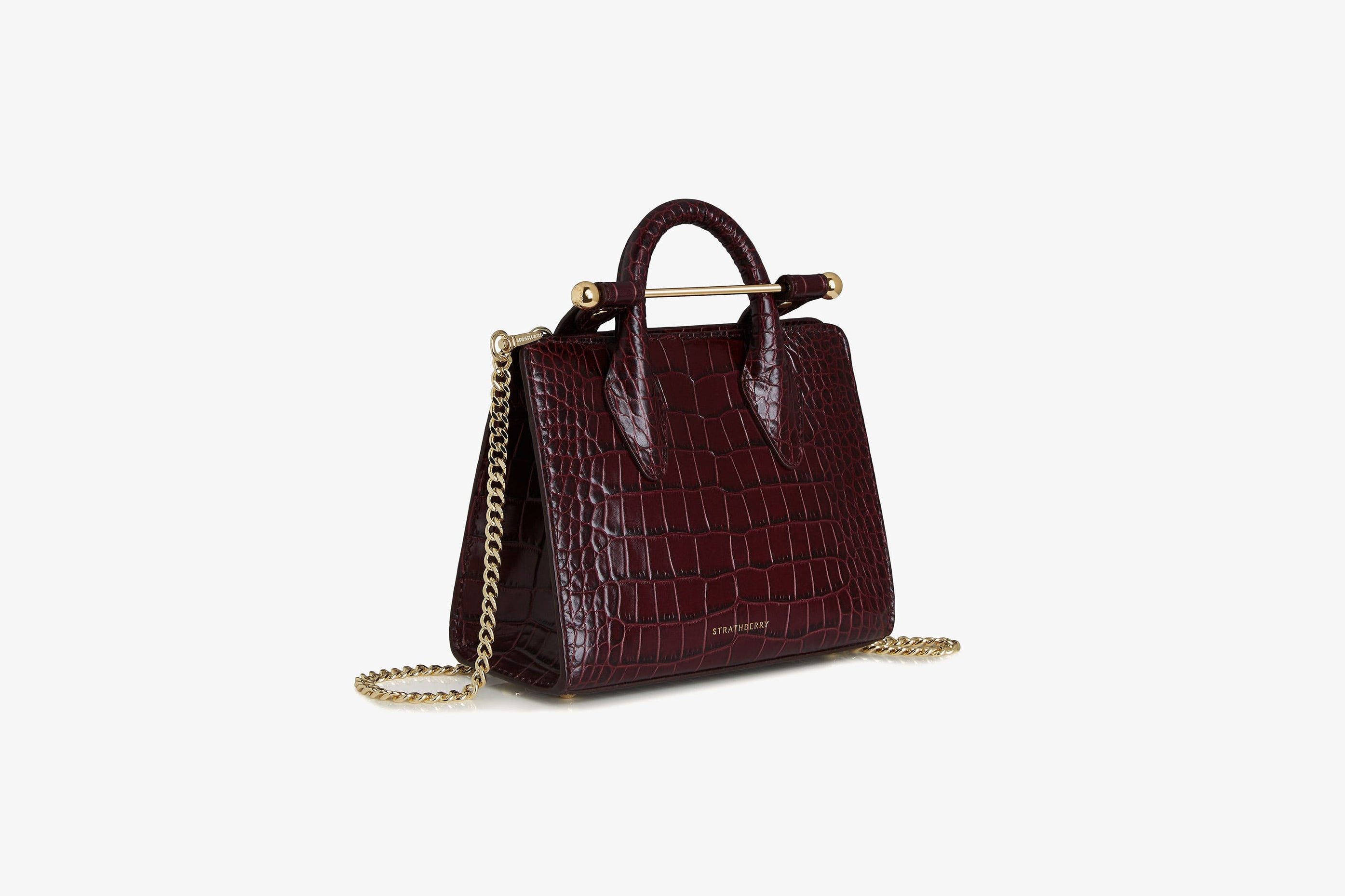 A view showcasing our The Strathberry Nano Tote - Croc-Embossed Leather Burgundy