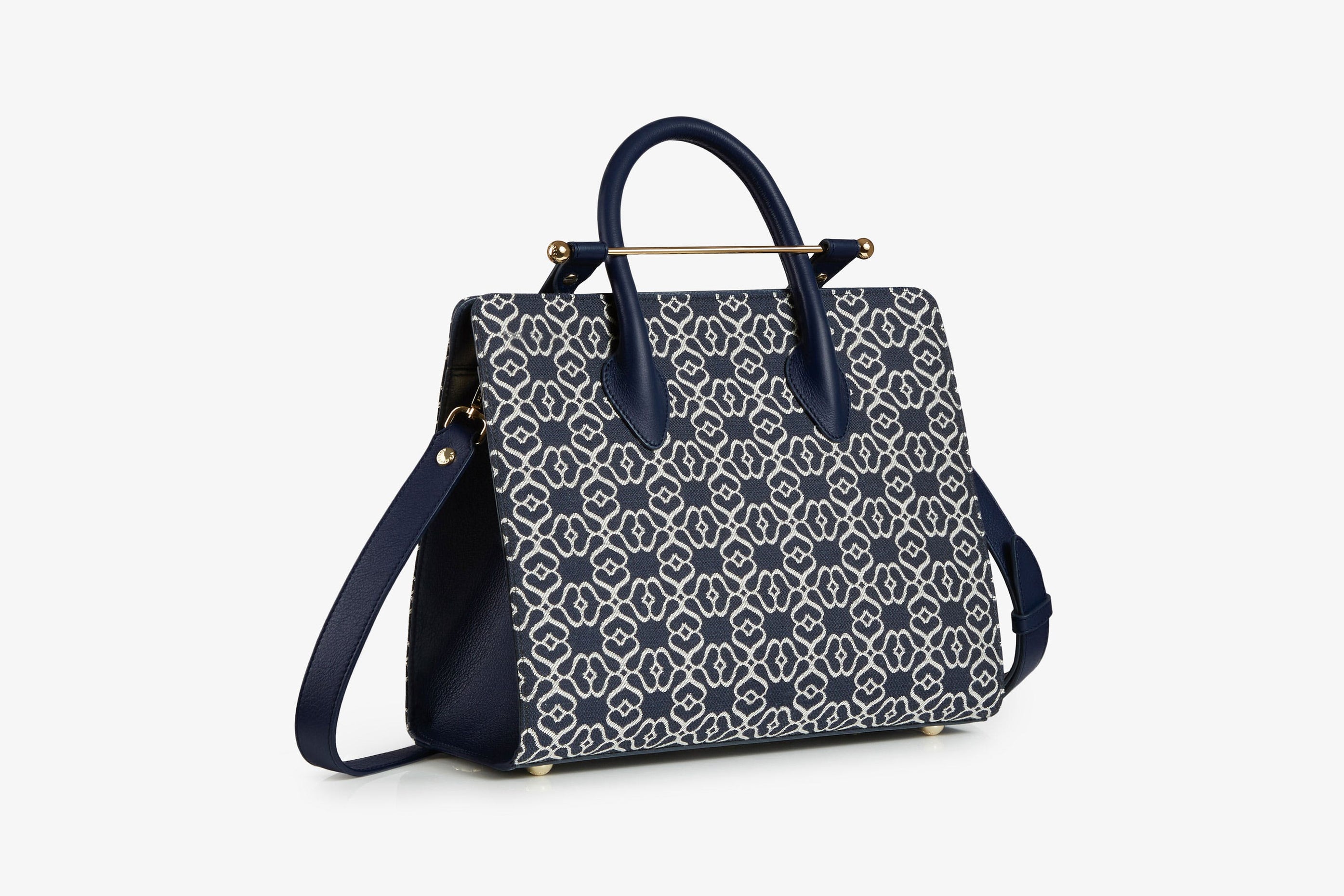 A view showcasing our The Strathberry Midi Tote - Monogram Jacquard/Leather Dark Navy