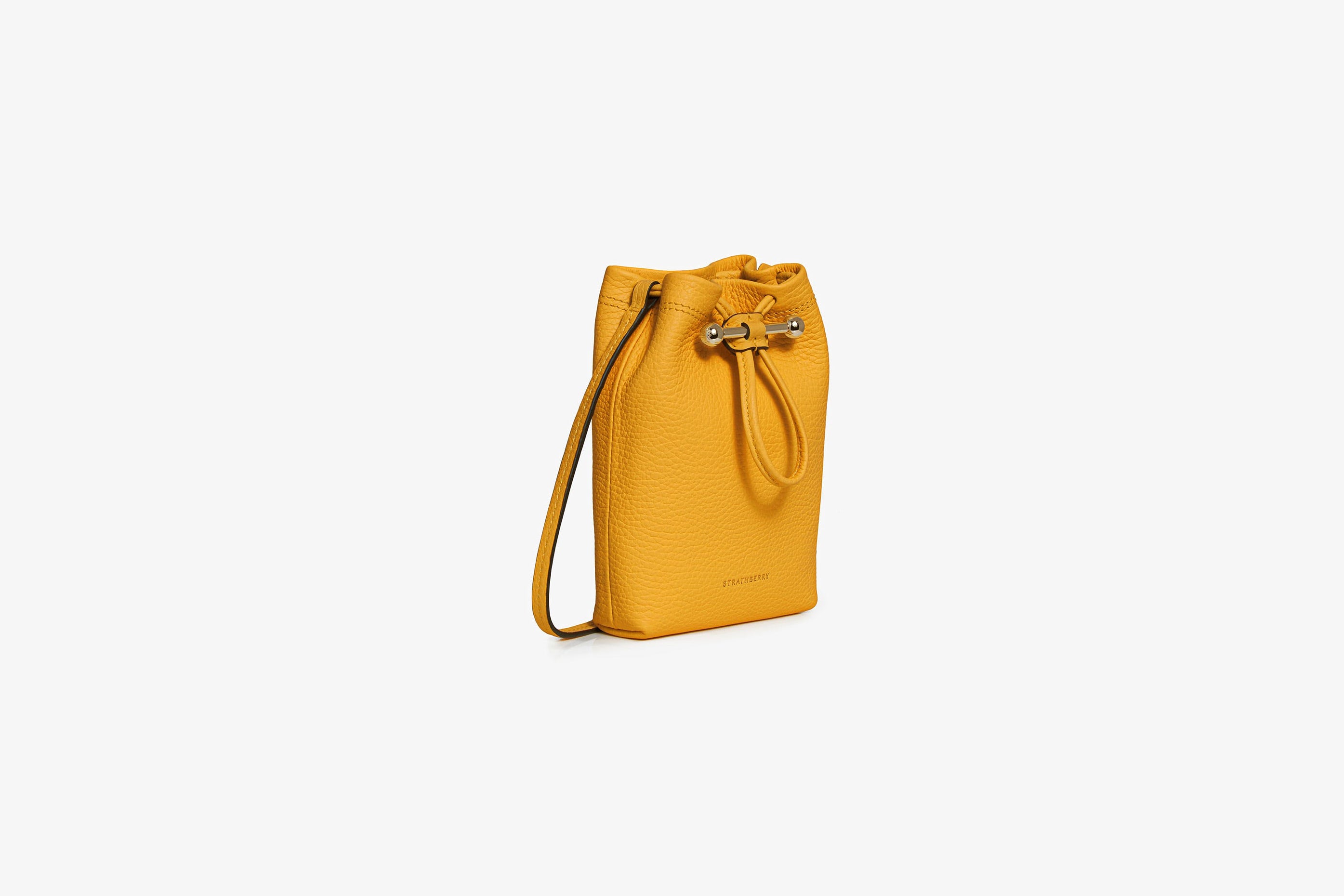 A view showcasing our Osette Pouch - Blossom Yellow with Maroon Edge