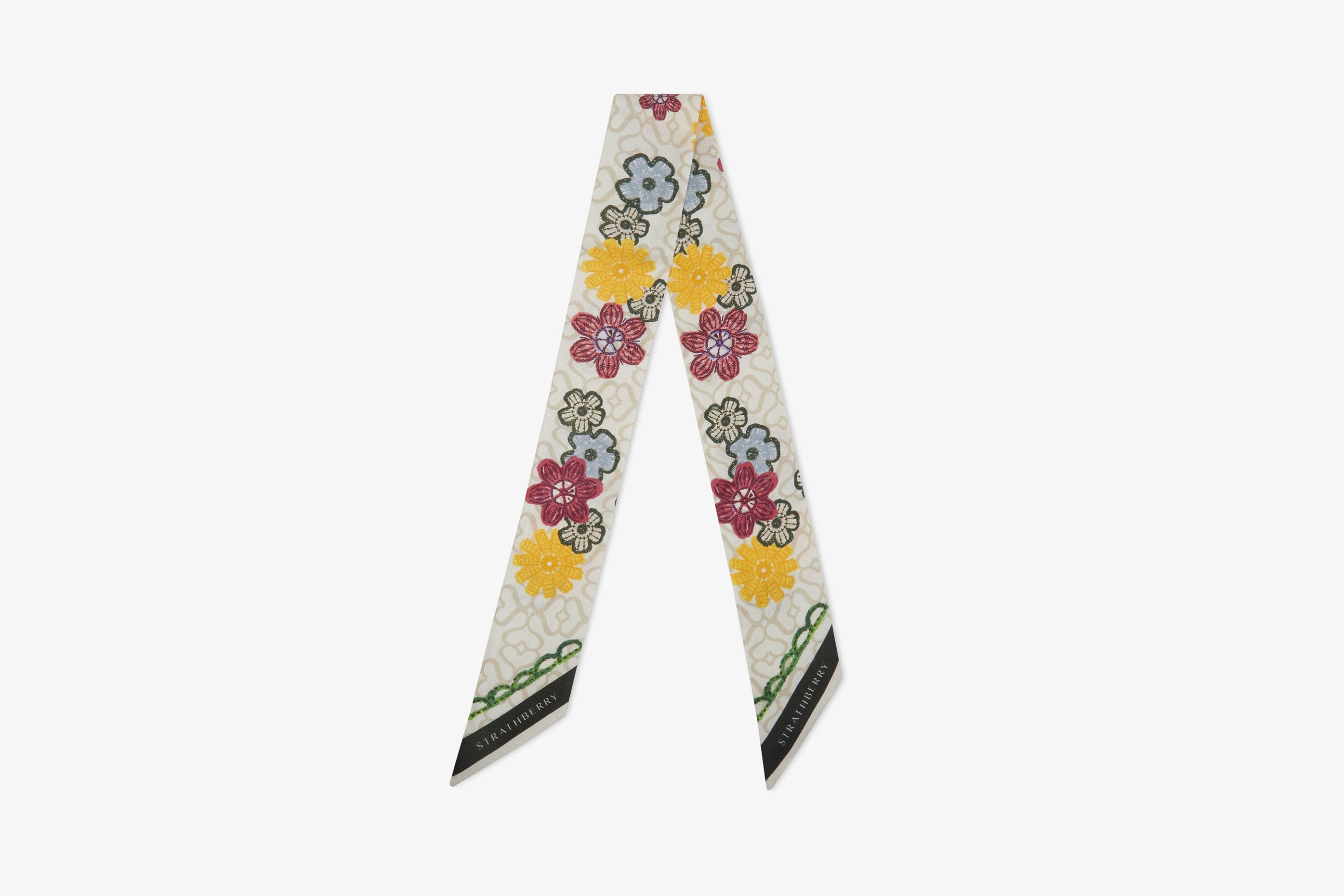 A view showcasing our Silk Skinny Scarf - Monogram Floral Print Yellow/Green
