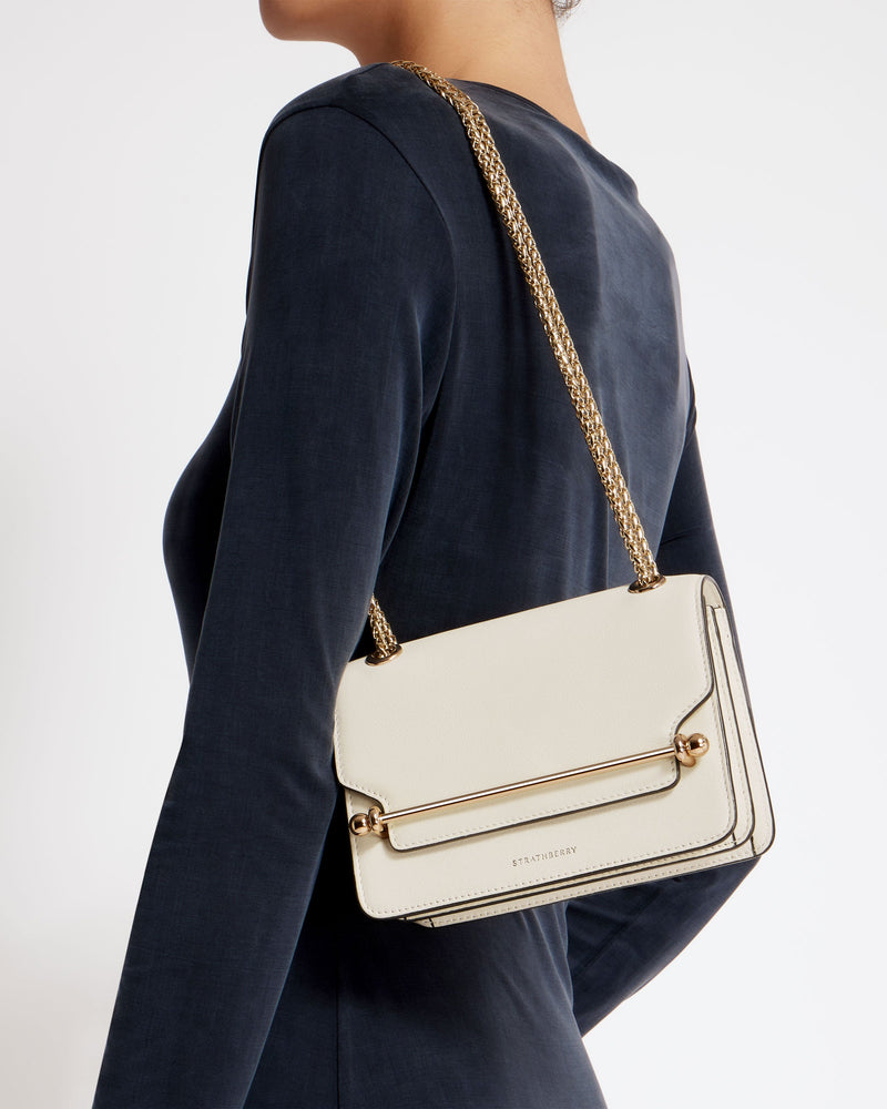 East/West Mini - Our best-selling silhouette is reimagined into the East/West Mini - an effortlessly chic mini bag designed to elevate your everyday look.