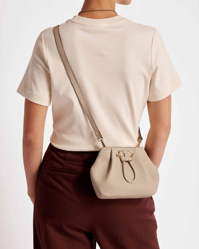 Osette Crossbody - Chic and impeccably functional, the Osette Crossbody boasts practicality for those needing to be hands-free and on the go.