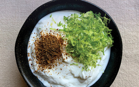 yogurt with lime zest and cumin on top
