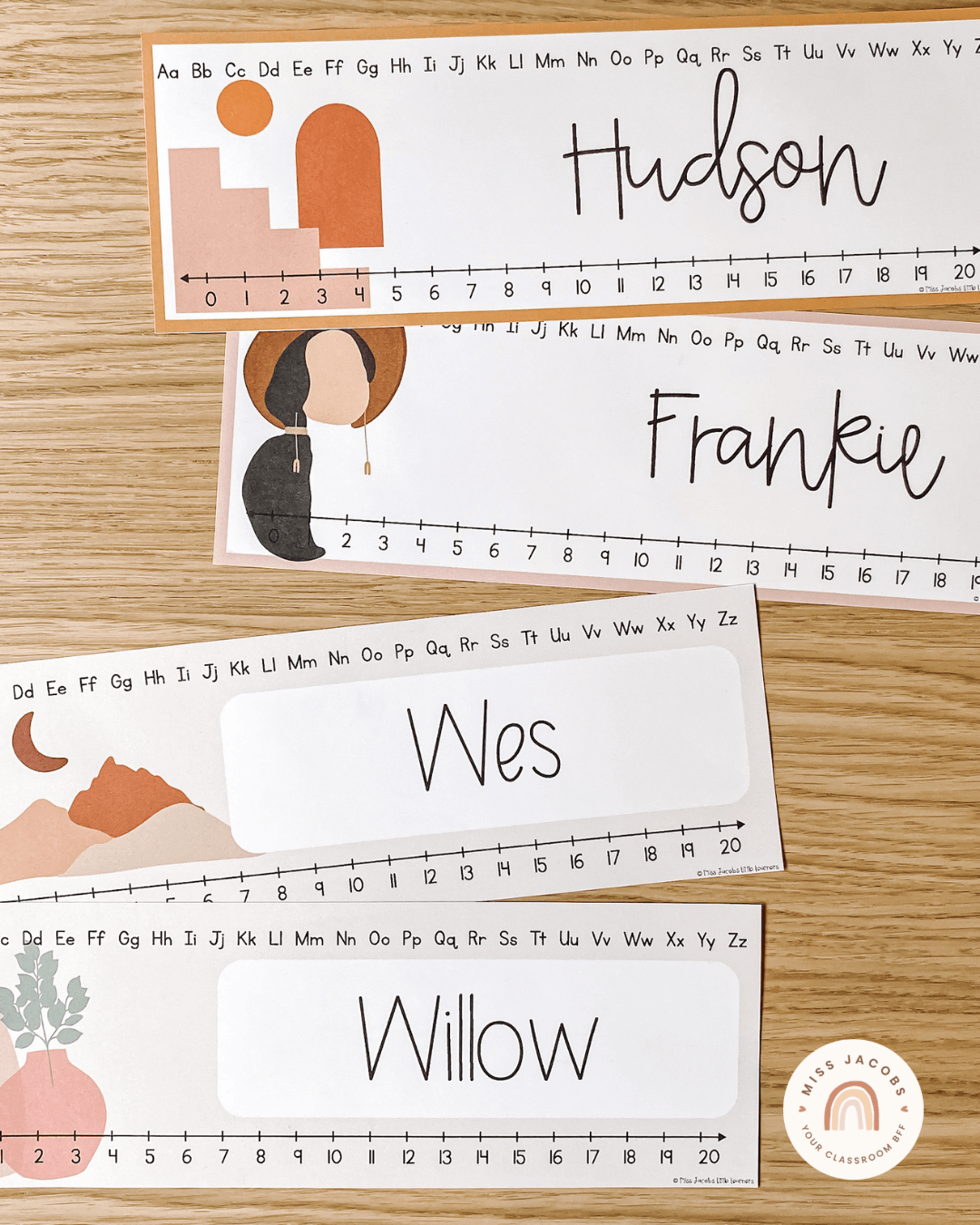 The left image shows Desk Plate Name tags from the Boho Vibes collection. They include warm, earthy-toned illustrations with the names Hudson, Frankie, Wes and Willow in cursive type. The right image is a cork pinboard with items from the same range including a classroom calendar, alphabet posters, a weather display and an ‘amazing work coming soon’ poster.