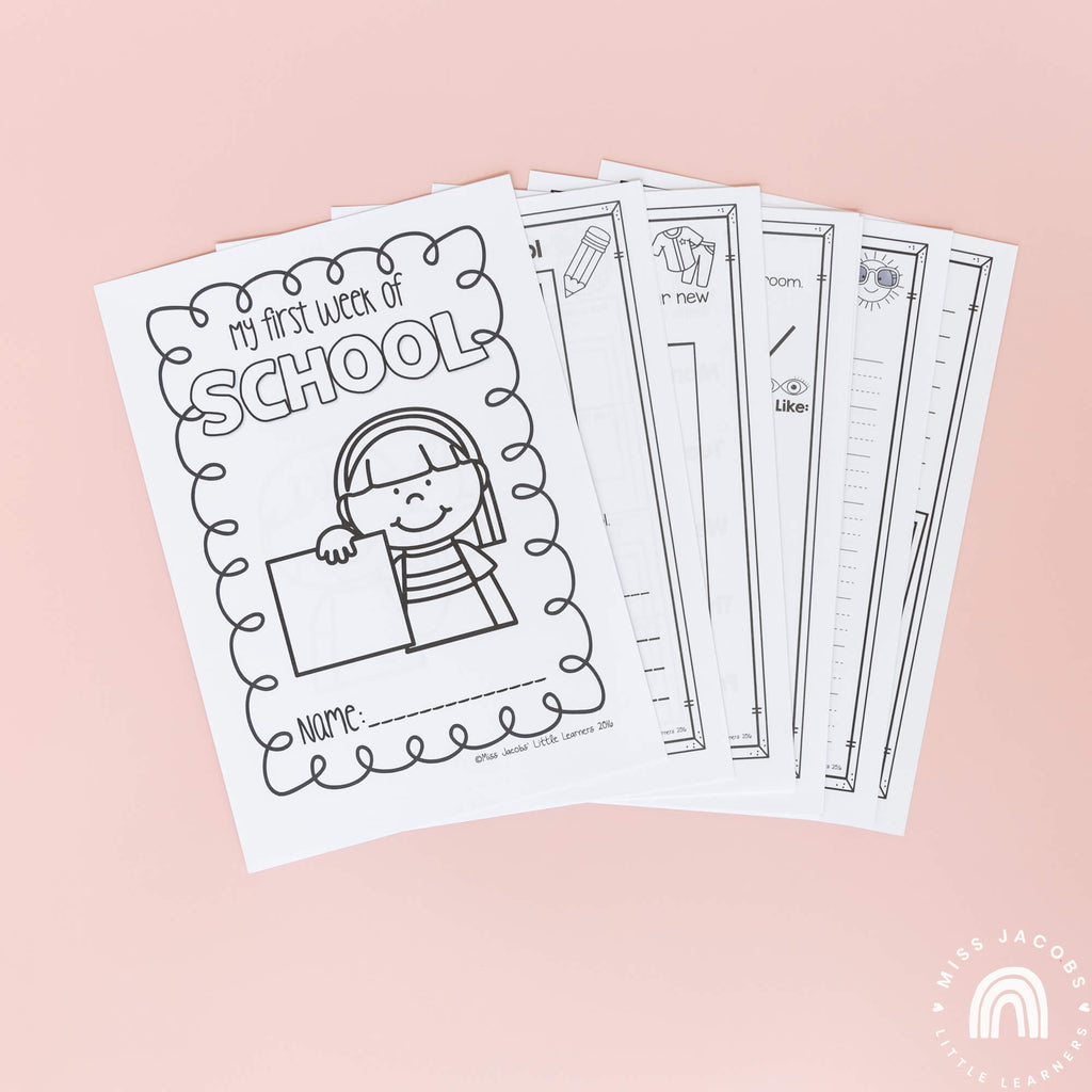 A set of white paper worksheets are fanned out across a pink background. The first worksheet reads ‘my first week of school’ with an illustrated girl smiling and holding a piece of paper.