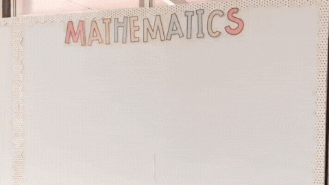 Gif from @miss_grosse_ setting up her maths bulletin board using the pastels decor collection
