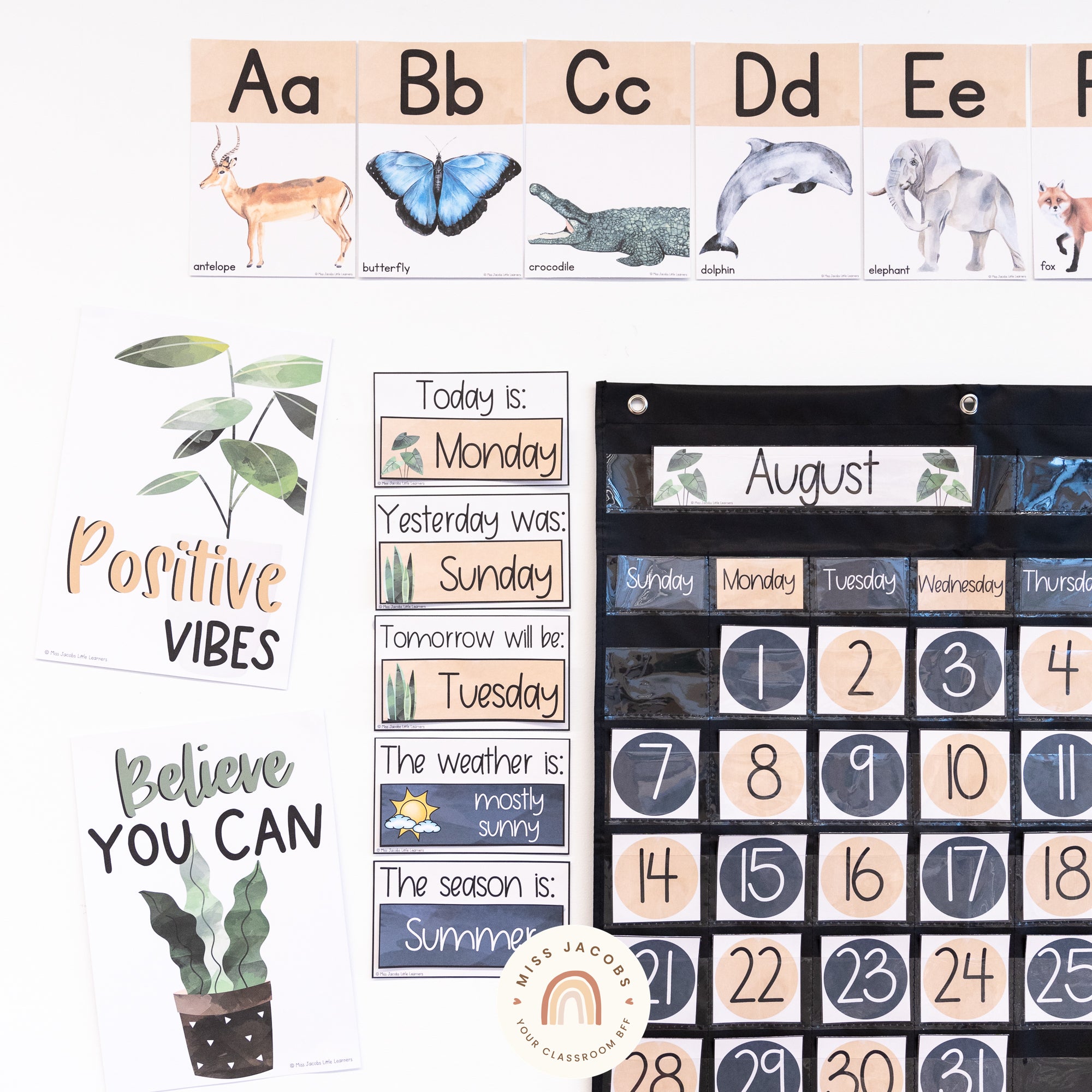 Two images show a closeup of a range of calendar displays in the Boho Plants theme. We see affirmation posters with phrases like ‘positive vibes’ and ‘believe you can’ as well as days of the week, numerals and alphabet posters. There’s a limited color palette featuring a soft peachy sand color, a dark gray and shades of green.