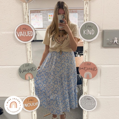 @meet.ms.moon standing in front of her Spotty Boho affirmation station mirror.