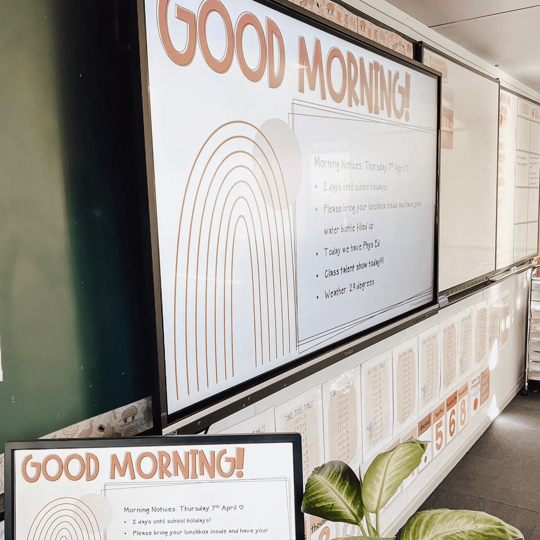 The left image shows a classroom with a green wall and the Boho Vibes Google Slides displayed on a large screen. The right image shows the same kind of slides on a laptop with plants and stationery in the background.