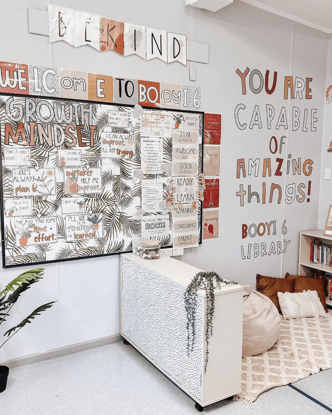 The left image shows a classroom with a range of wall displays, including bunting that says ‘be kind’ and large letters that spell ‘You are capable of amazing things’. It’s all from the Boho Vibes range. The right image shows three affirmations from the Spotty Boho range, they say ‘I am unique,’ ‘I am strong’ and ‘I am loved.’