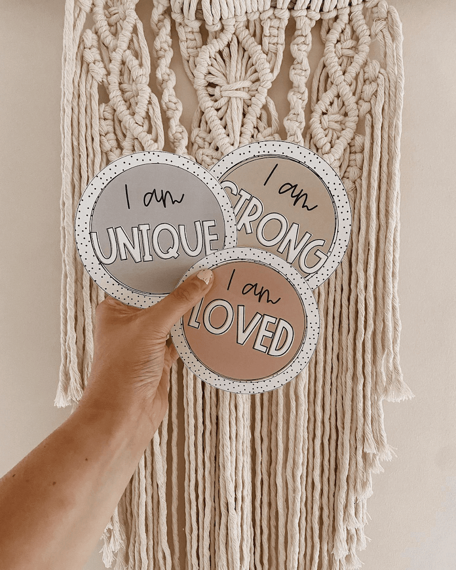 The left image shows a classroom with a range of wall displays, including bunting that says ‘be kind’ and large letters that spell ‘You are capable of amazing things’. It’s all from the Boho Vibes range. The right image shows three affirmations from the Spotty Boho range, they say ‘I am unique,’ ‘I am strong’ and ‘I am loved.’