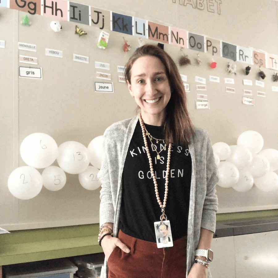 Two images show two more whiteboards with numbered balloons in neutral and white tones. The left shows Swedish lettering and on the right we see some French words on the board. On the right a teacher wears a tshirt that reads ‘Kindness is golden.’