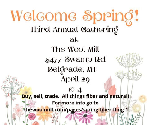 A sign with info on the Spring Fiber Fling event with flowers in the background.
