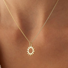 Gold sun necklace
