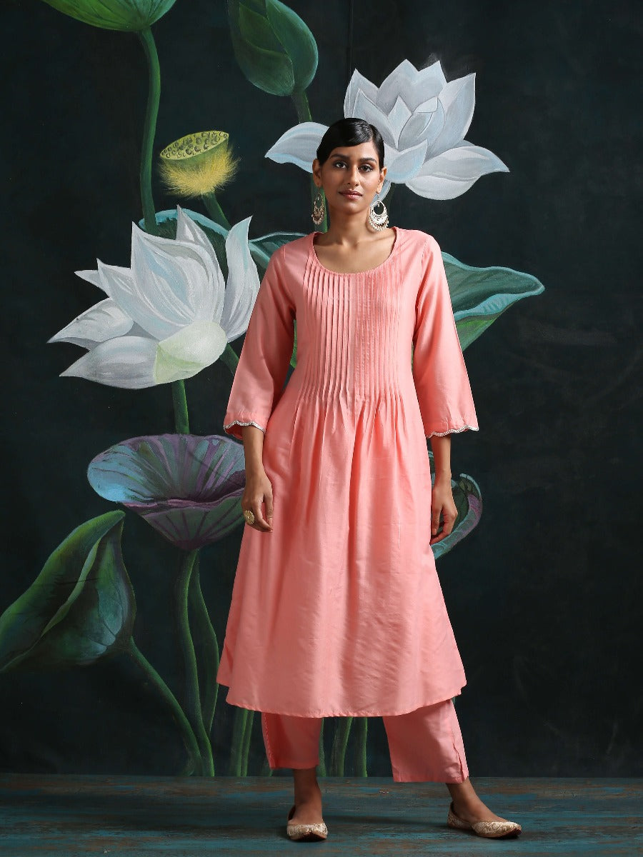 Cotton silk pleated flared kurta with detailed sleeves and pockets, along with straight bottoms Pink