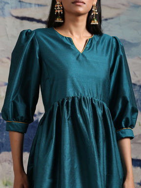 Cotton silk gathered kurta with U-hemline and contrast piping & facing, along with pleated pants Green