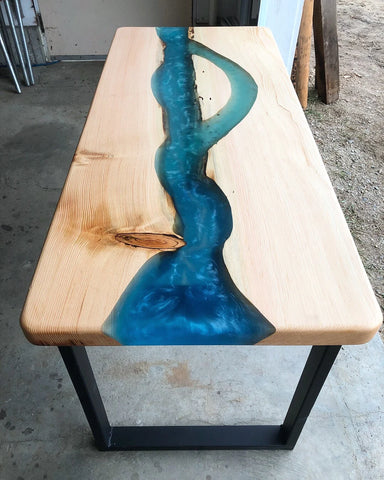 Satin finish on a blue epoxy river table featuring metallic pigments using UVPoxy