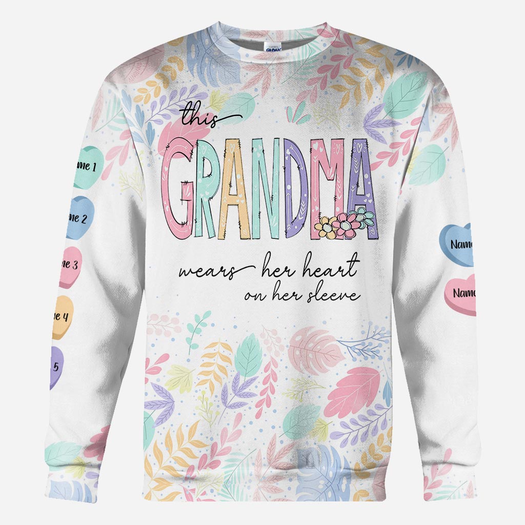 This Grandma Wears Her Heart On Her Sleeve - Personalized Grandma All Over T-shirt And Hoodie