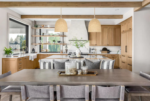 Large kitchen and dining area with wood beaded pendants