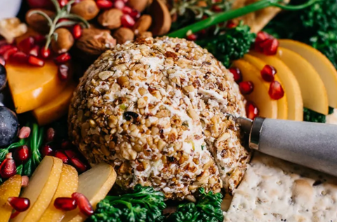 vegan cheese ball with nuts, fennel and chives