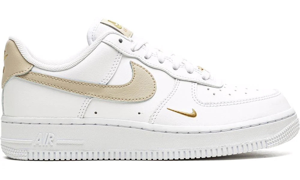 white and gold nike air force ones